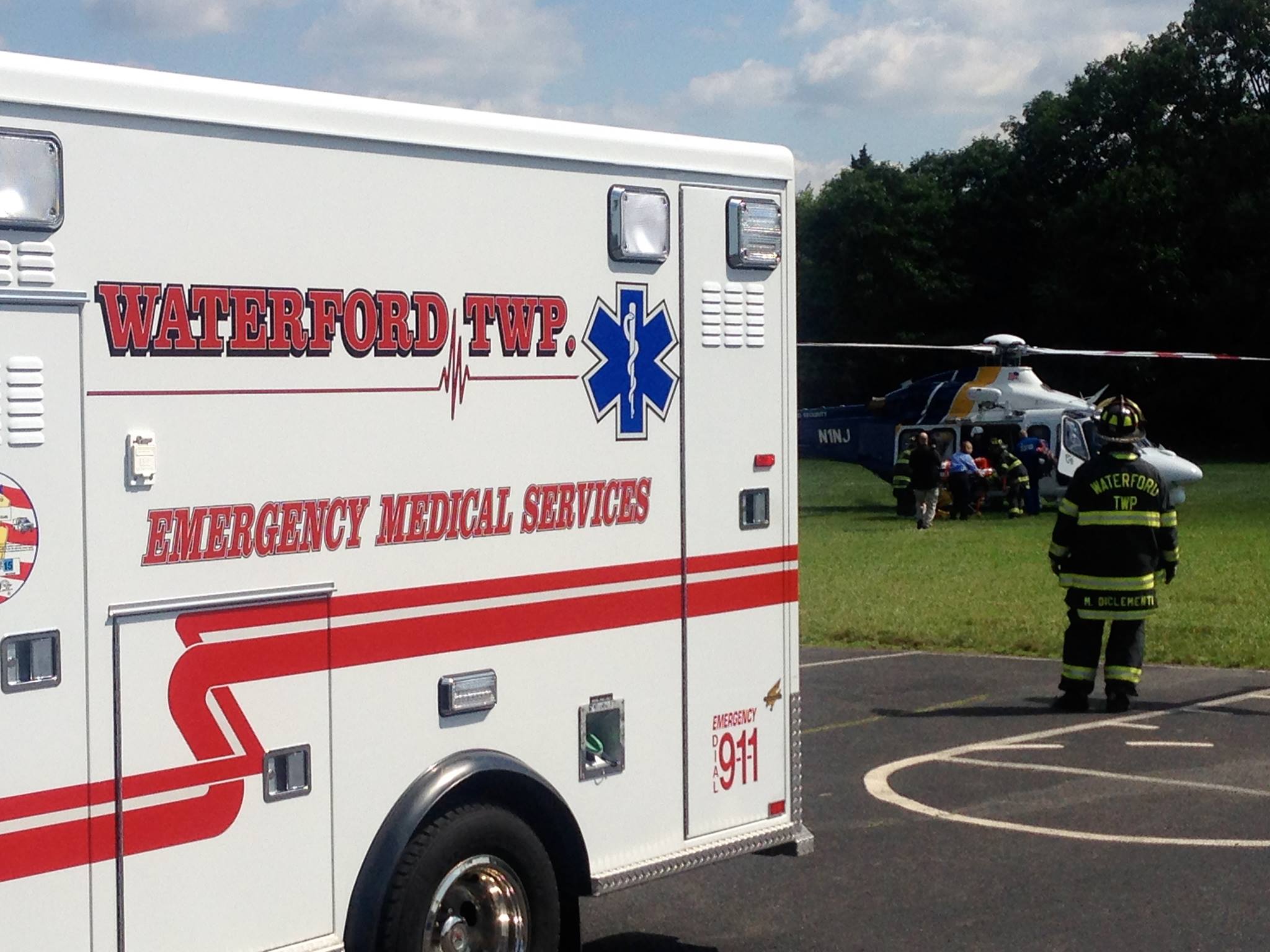 Waterford Township ambulance alongside an emergency response helicopter